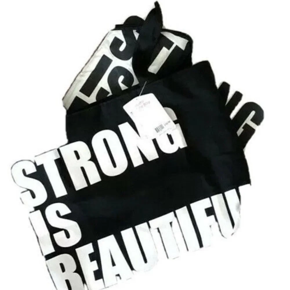 Layer 8 Studio Tote bag Black Strong is Beautifull
